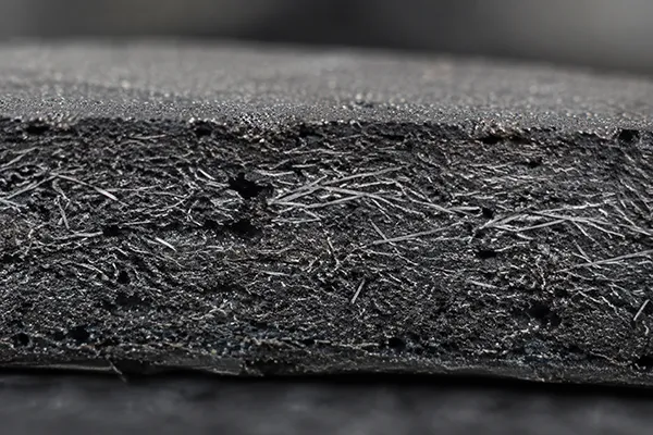 Ceramic brake pad material showing fine fiber composition for low-dust performance