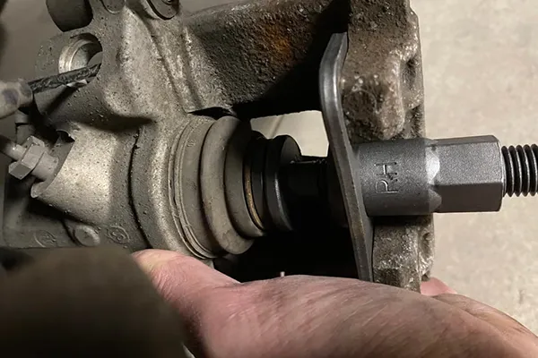 mechanical movement test for a brake caliper piston